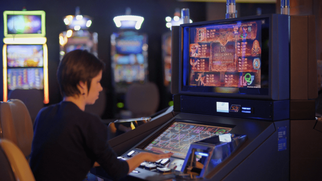 woman playing slot machine