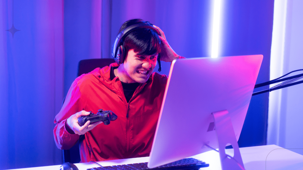 asian guy playing computer game