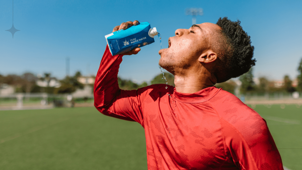 athlete drinking beverage