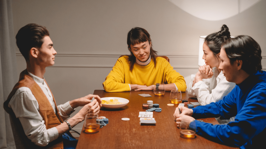 group of people playing poker