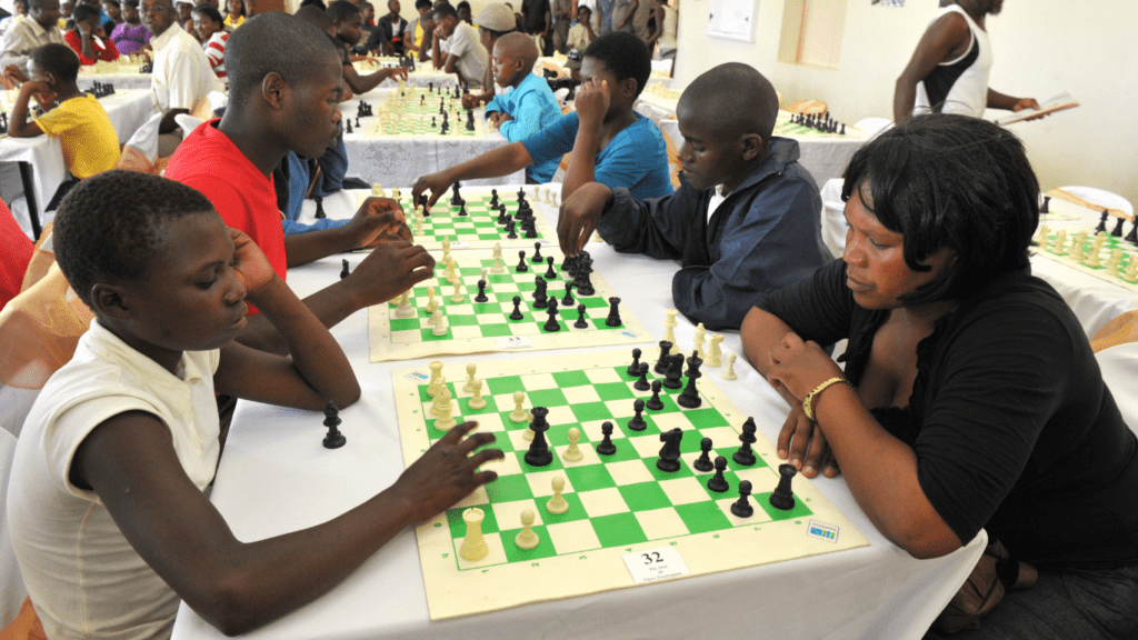 people competing in chess