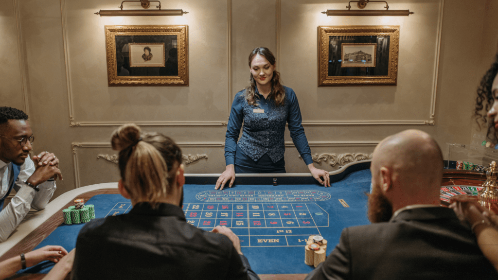 players betting on a roulette table