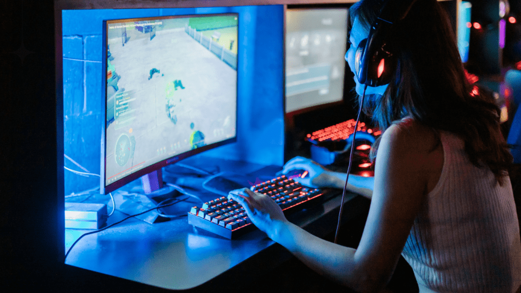 teenage girl playing online pc game