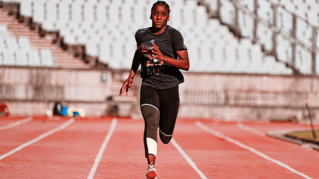 woman running on track